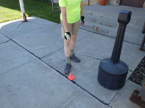 GDMBR: The Ranger Station humorously pints out a gap in the cement walkway.